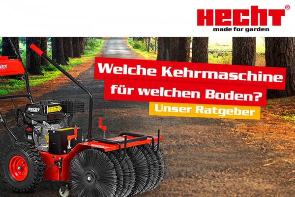 Eine Kehrmaschine von Hecht auf einem Waldweg.